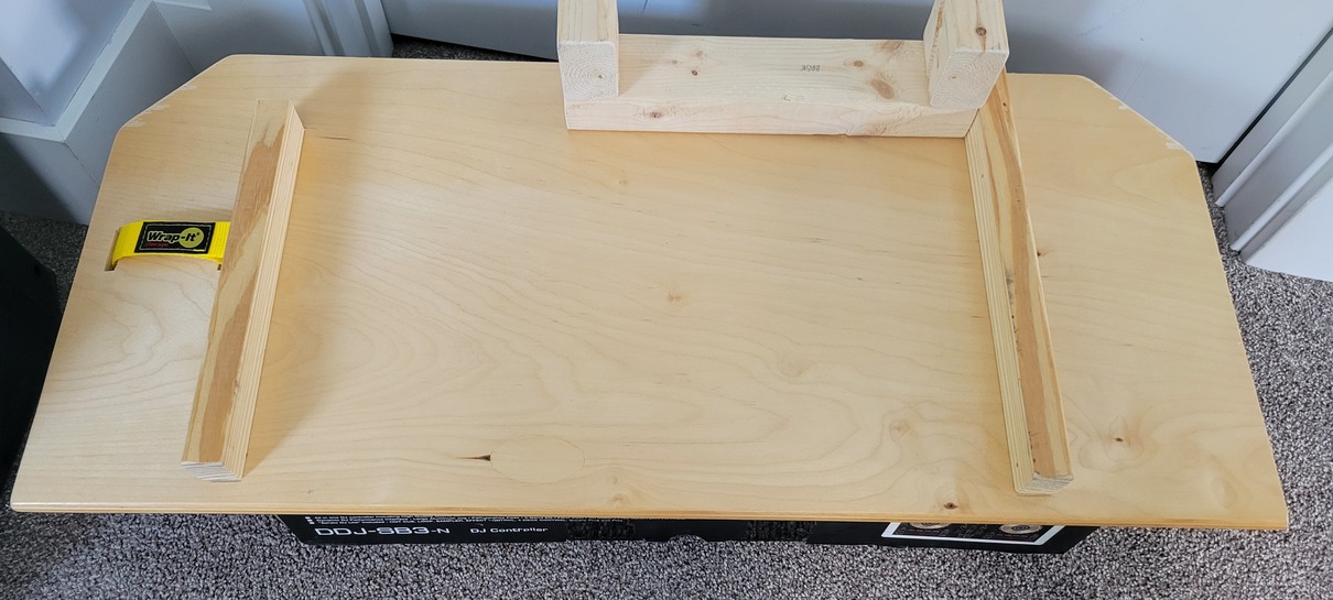 wood board with velcro strap and wood guide pieces